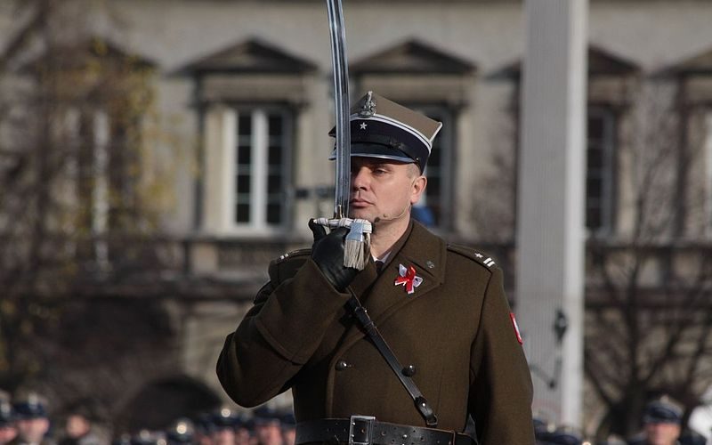 Polish Officer holding a Scimitar Sword