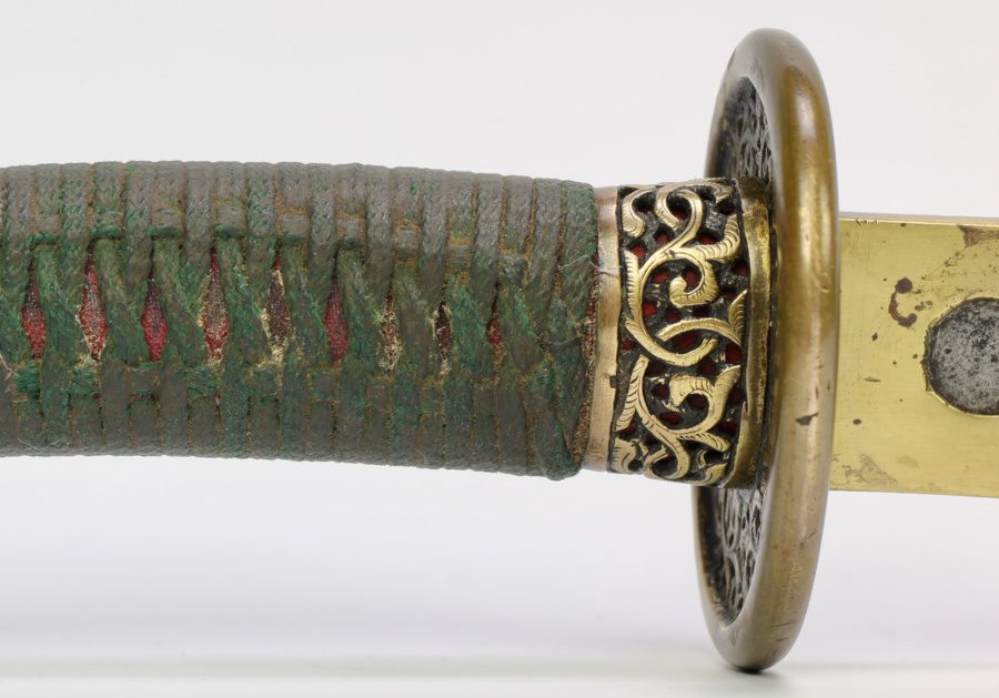 A Chinese saber ferrule of the round style Late 18th early 19th century