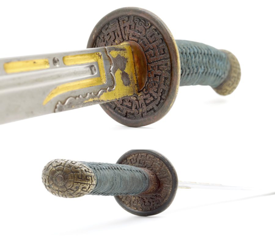 Kuiwen motifs on the hilt fittings of a Qing saber late 18th to early 19th century