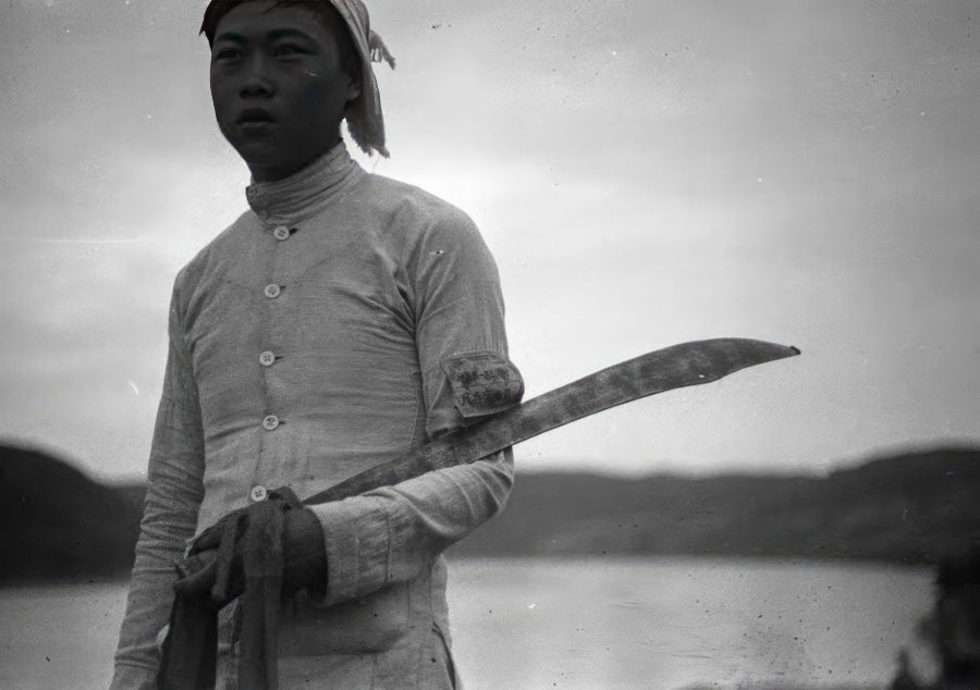 Member of the Min Ping militia in Yanan with sword. Photo by Harrison Forman 1944