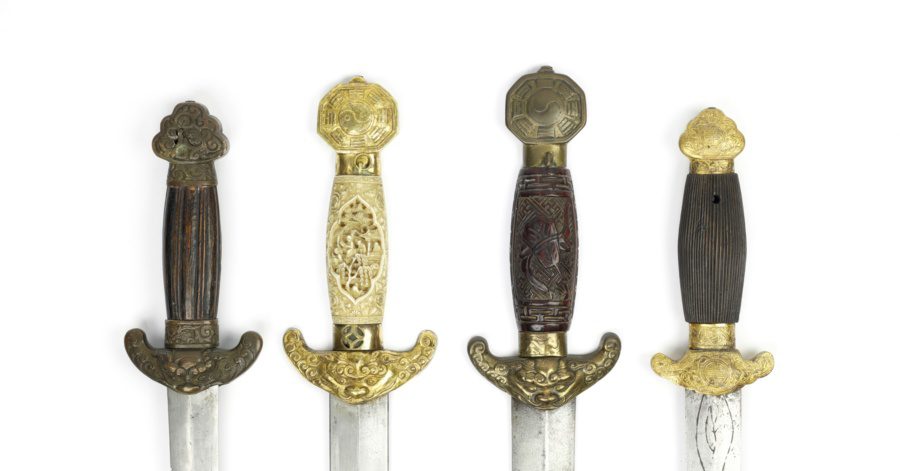 Sword guards on four Qing dynasty jian