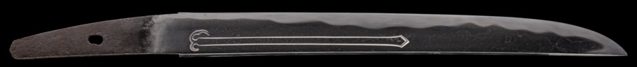 A tanto blade featuring the mune from the beginning of the tang to the point area