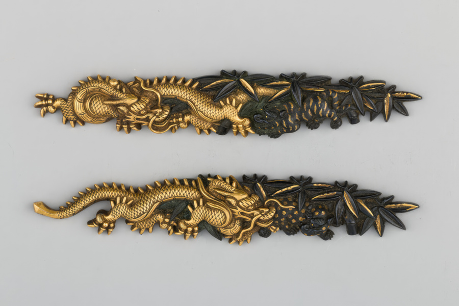 A pair of menuki crafted using the traditional metalworking